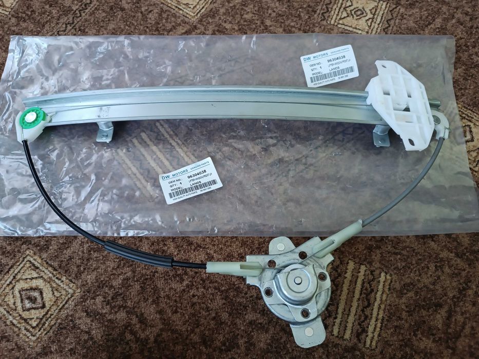 Склопідйомник GENUINE Ланос, Сенс передній лівий (МЕХАНІЧНИЙ)