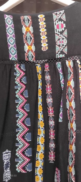 Blusa/Tunica de Mulher
