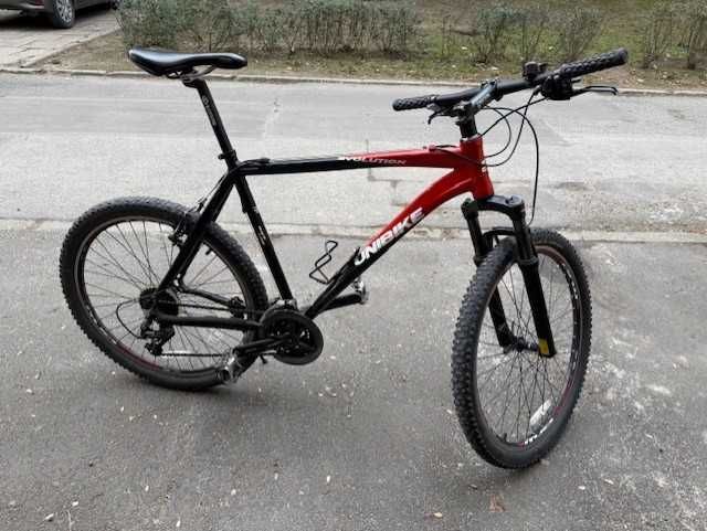 UNIBIKE Evolution; MTB; rama 21; koła 26; przerzutki shimano 3x8