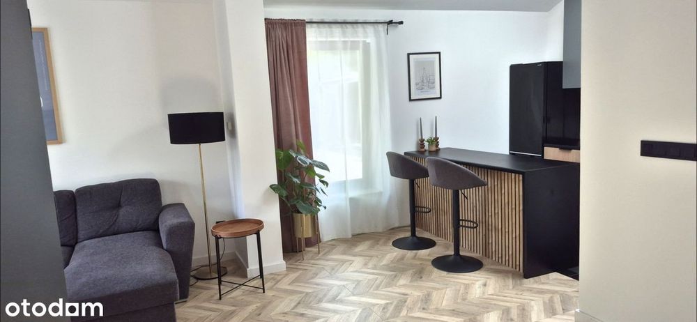 WYJĄTKOWY APARTAMENT z ogródkiem i przestronnym tarasem.