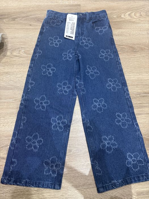 Nowe szerokie jeansy dziewczęce - roz. 122