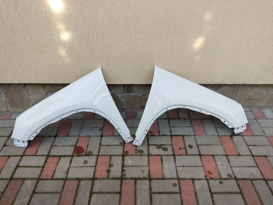 Передні крила VW Tiguan 2007-2016 оригінал білі