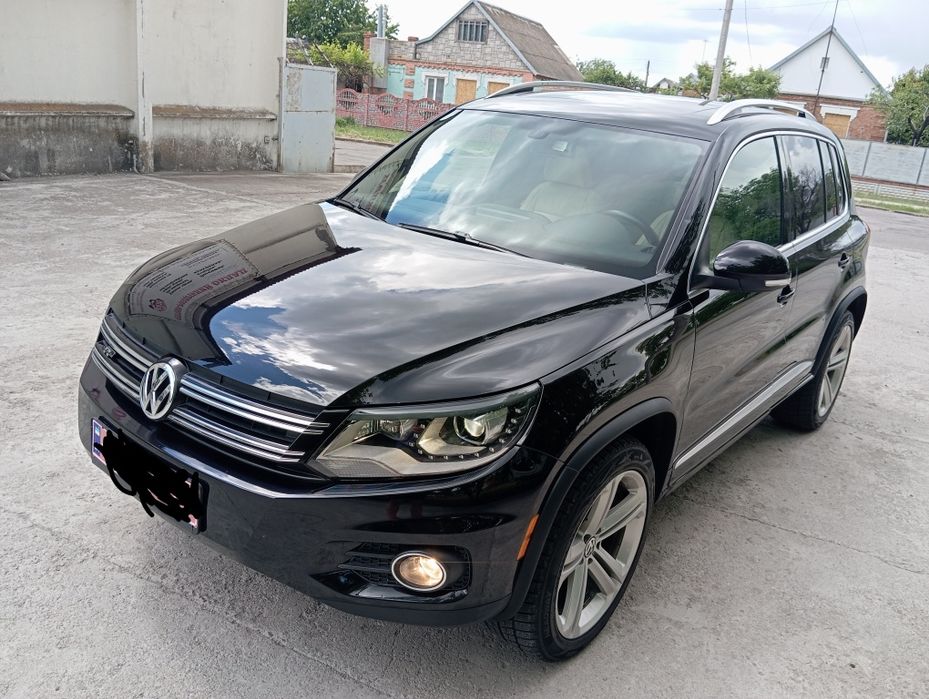 Volkswagen Tiguan 2014 VIN WVGAV7AX4FW009831 фото оголошення 2 з 24