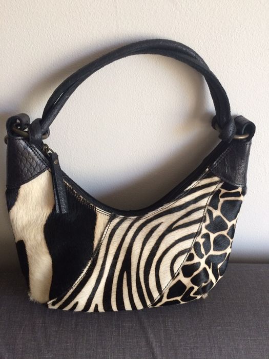 Malas de senhora em pele e pêlo