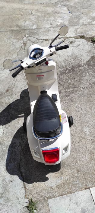 Vespe eléctrica criança