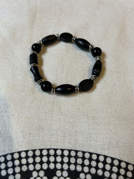 Pulseira preta. Nunca usada.