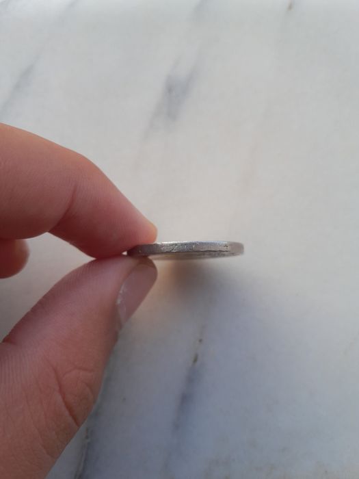 Moeda de 2€ dos Países Baixos, de 2001, com o perfil da Rainha Beatrix