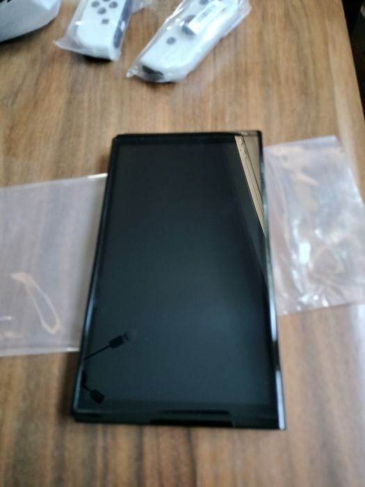 Nintendo Switch OLED Białe (White) – Stan BDB / Ekran BEZ RYS / 0 Driftu / Pudełko + Pokrowiec