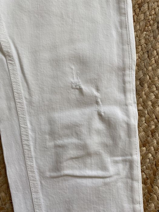 Białe spodnie jeansy Zara 36