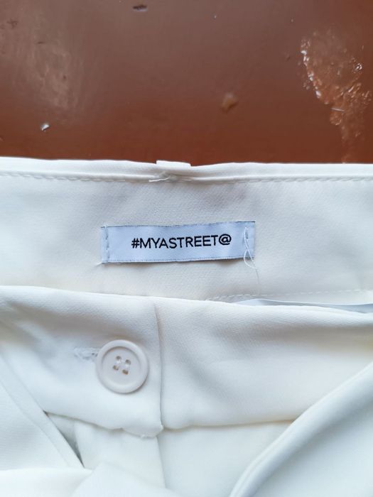 Світлі брюки розмір м 44