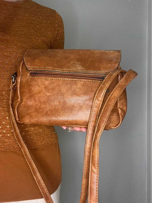 Mala a tiracolo ajustável, sem sinais de desgaste