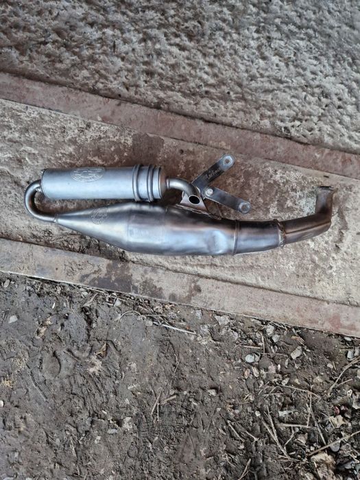 Вихлопна труба на діо 34 лео тт