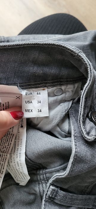 Szare jeansy z przetarciami / spodnie jeansowe vintage / slim fit