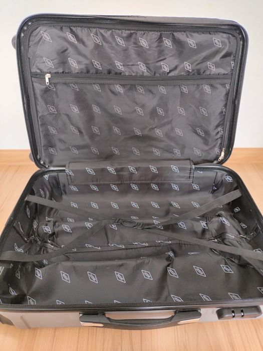Srebrna średnia walizka M/XL  marki RGL