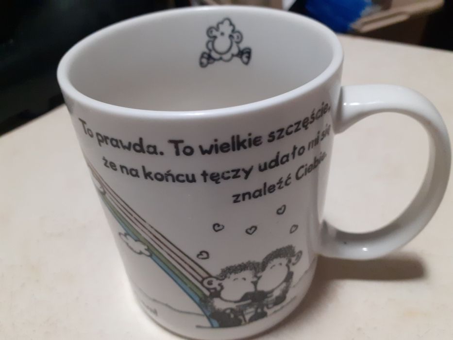 Kubek z ciekawa sentencją