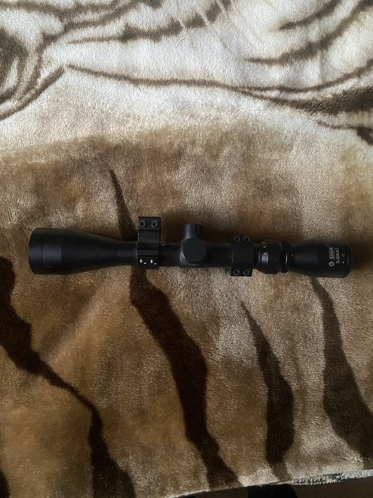 Оптичний приціл в гарному стані.