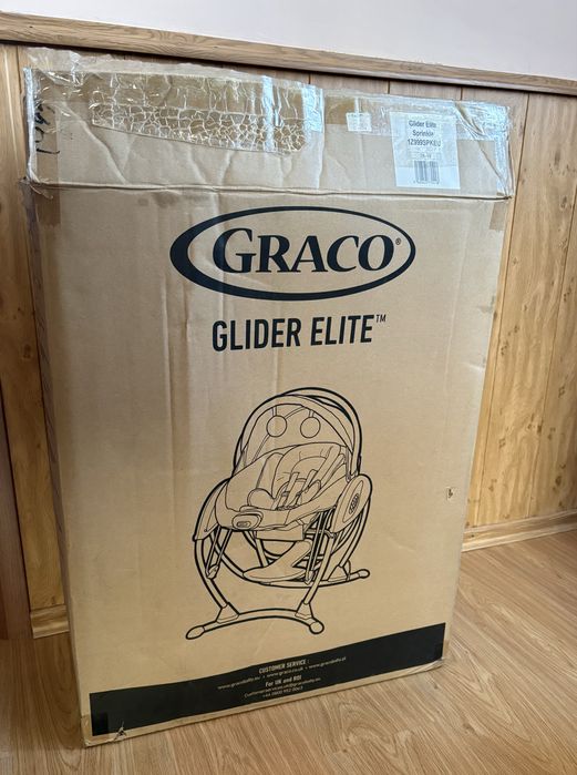 Заколисуючий центр Graco glider elite