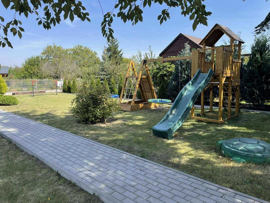Zadbana działka ROD Pod Lipami Września ul. Działkowców 411 m² – dużo zieleni, plac zabaw, idealna dla rodziny - Widok 6