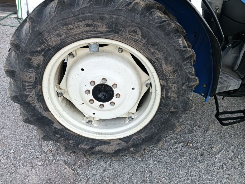 Trator New Holland TN60A Carregador frontal.