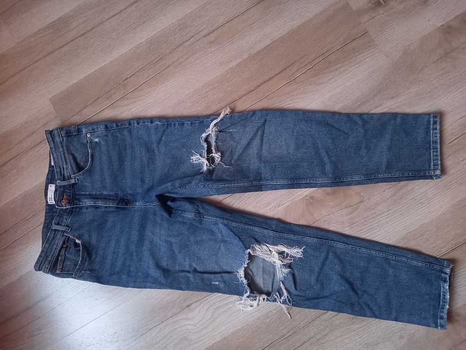 ASpodnie jeans Denim Sinsay roz 42 XL z rozdarciami
