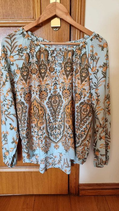 Blusa de senhora da Natura