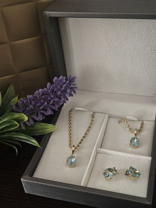 Conjunto em aço dourado colar,pulseira e brincos