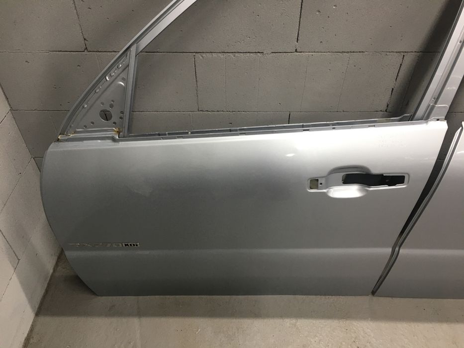 Дверь передняя задняя левая правая Ssang Yong Rexton Рекстон запчасти