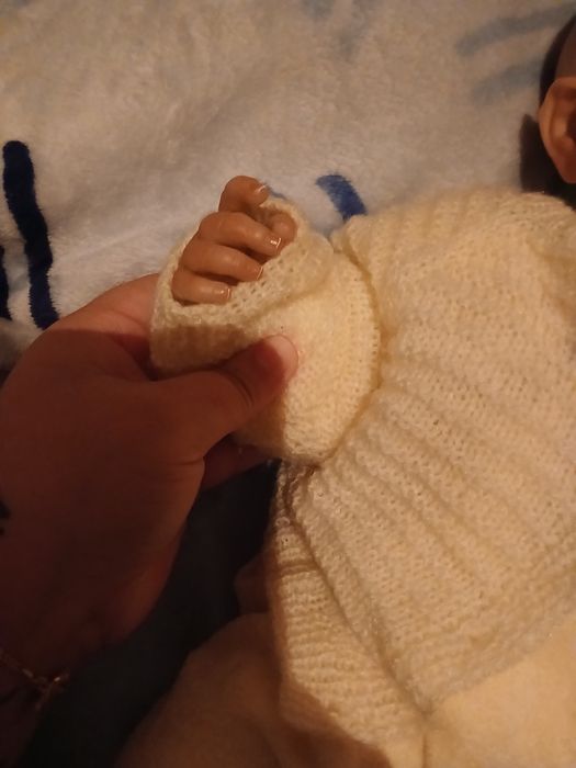 Bebe reborn com os olhos abertos