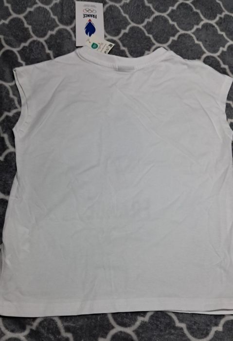 Nowa koszulka bez rękawów biała France Francja r 122