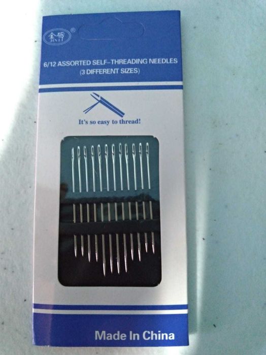 conjunto de agulhas de coser entrada da linha facilitada