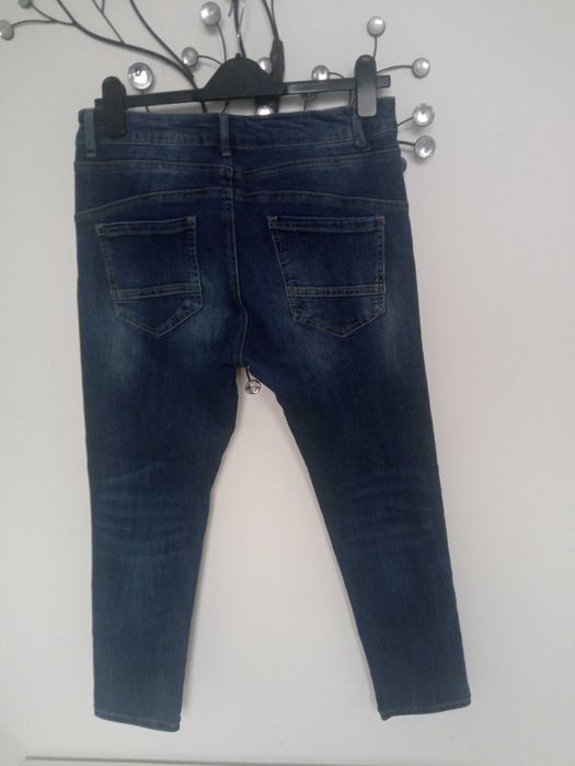 Melly & Co damskie spodnie jeans r L pas 80-90cm