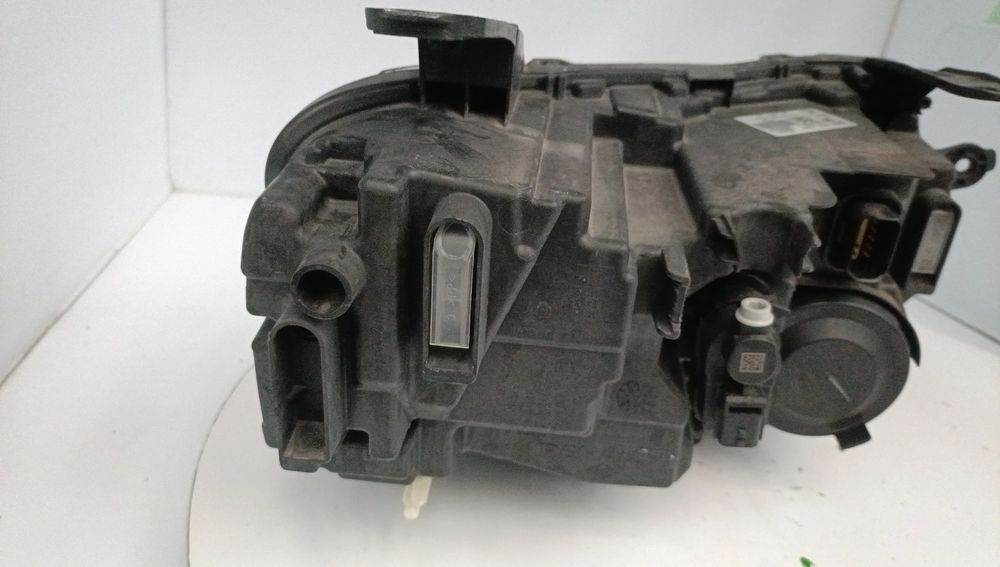 Ótica / farol esquerda DACIA Duster (HM_)