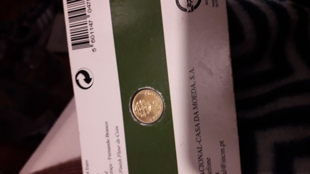 Mágñica moeda em ouro