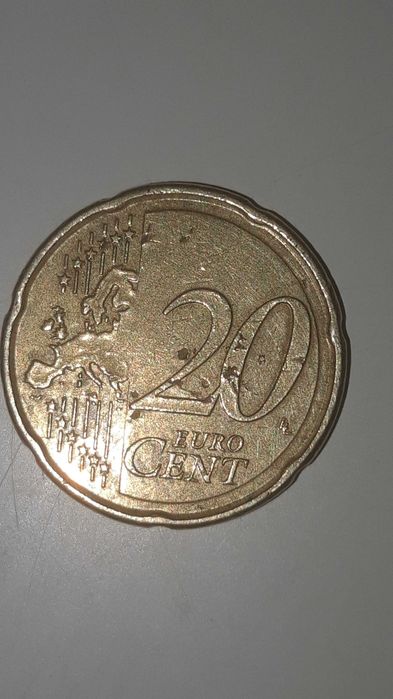 Moeda de 20  centimos com defeito.