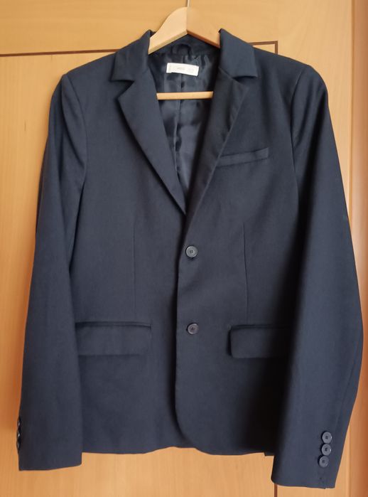Dark blue blazer for boys. Brand Mango. Size 13/14 years old. Used
