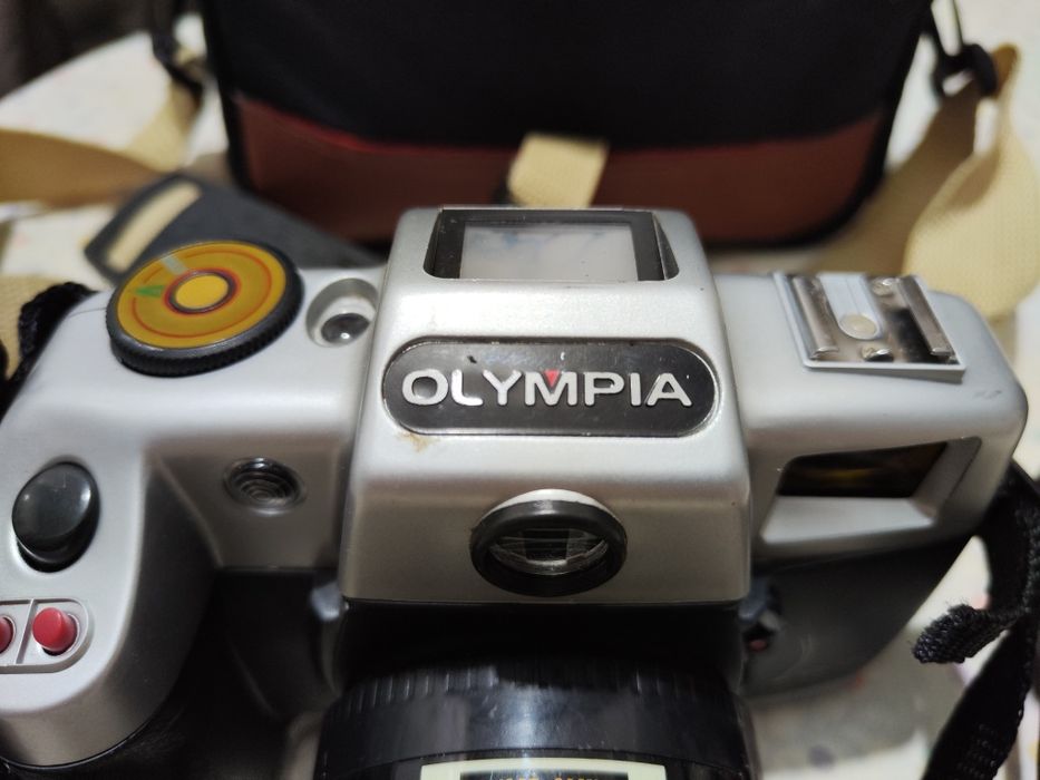Máquina de fotografia da Olympia