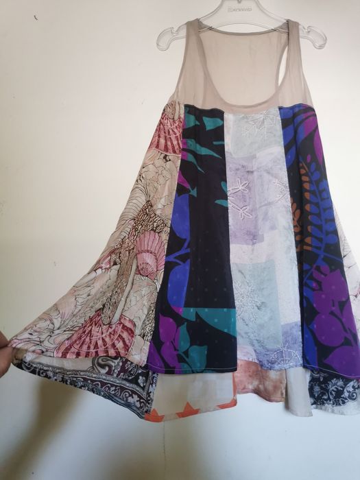 Jedwabna bluzka boho patchwork – rozmiar 4
Materiał:  jedwab

Zjawis