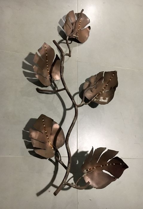 Escultura em metal com luz Nova
