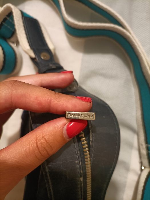 Mala azul escura da marca Bimba & Lola