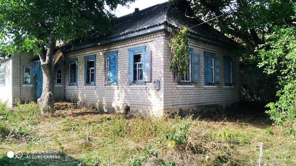 Продам приватизовану земельну ділянку разом з будинком.