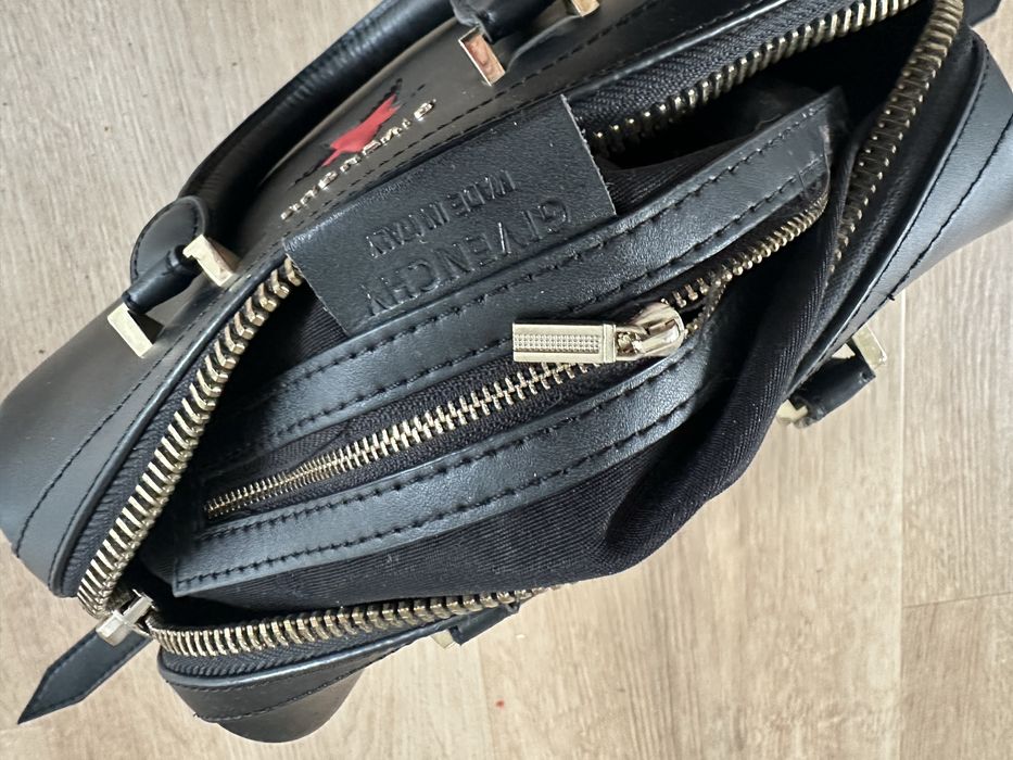 Uzywana torebka czarna givenchy na pasku czerwona gwiazda