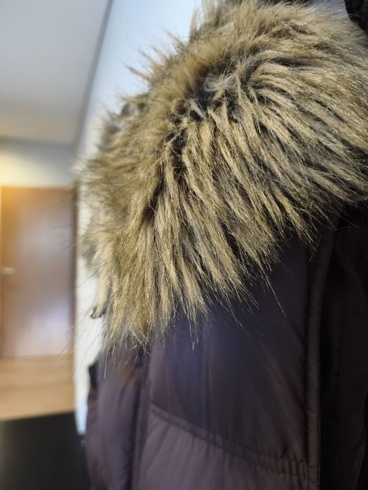 Colete com pêlo castanho