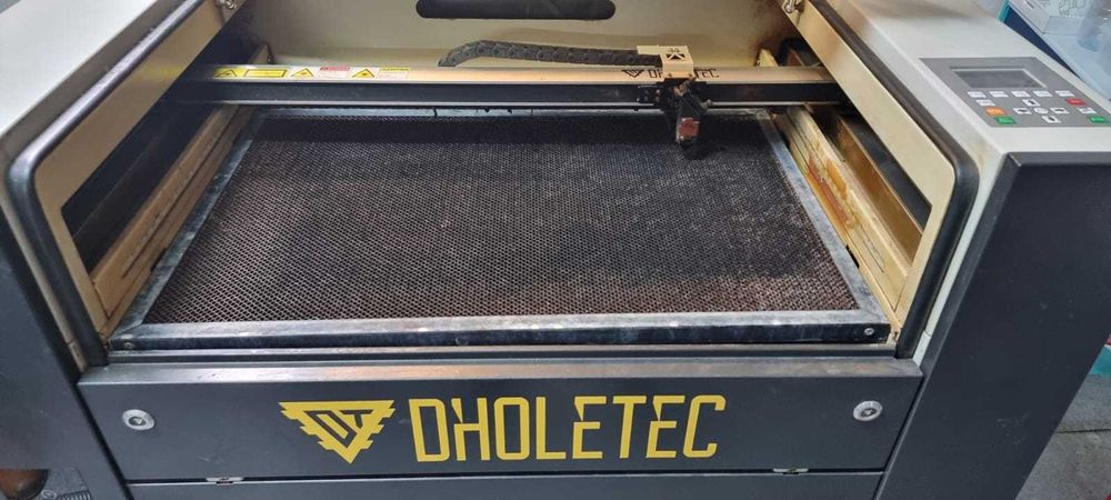 Máquina de gravação e corte a laser Dholetec
