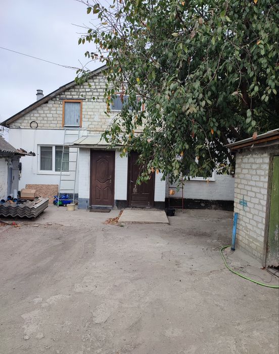 Продам в Харківській  обл, м.Балаклії 1/2 частку часного будинка