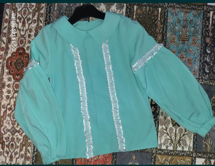 Блуза с пышным рукавом и воротником.128р мята