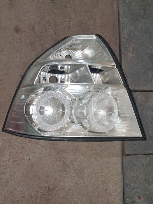 Стоп, корпус, скло , фонарь задній лівий авео Т250, Заз Вида.