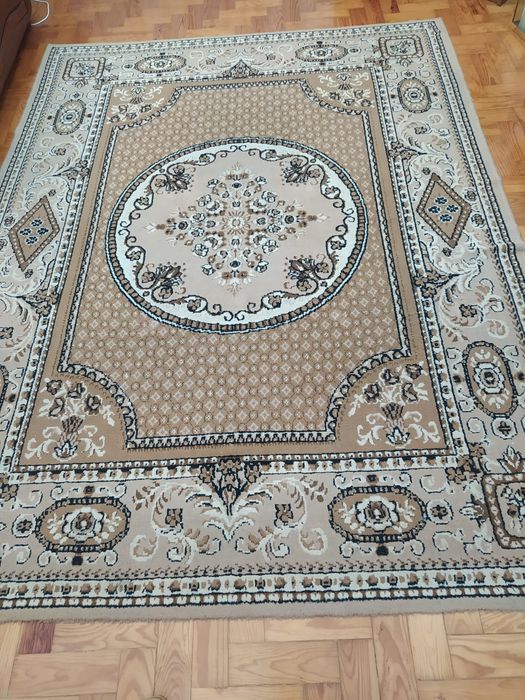 Carpete, tapete de sala.