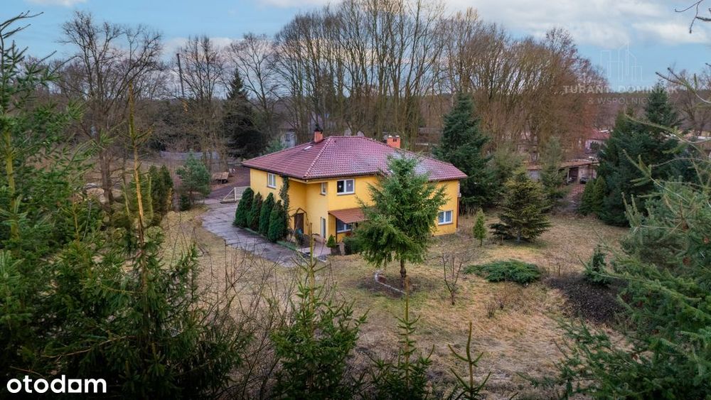 Przestronny dom z dużą działką – Dębostrów
