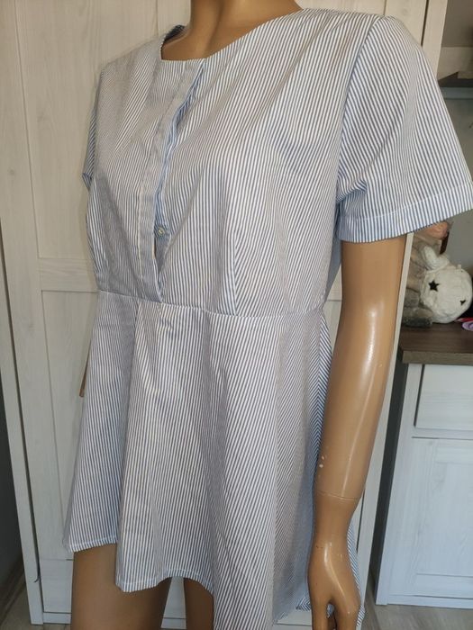 Bluzka  błękitno  biały  prazek z  baskinka