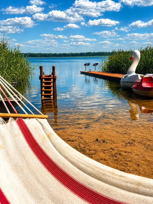 Domek nad jeziorem  z jacuzzi, sauną, plac zabaw